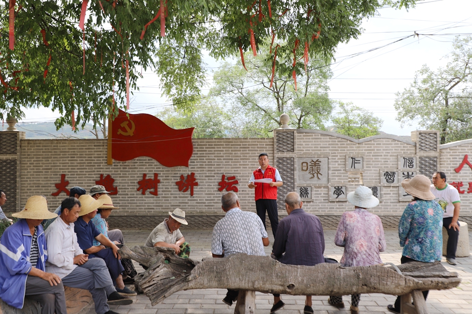 贾川乡梅江村开展社区活动
